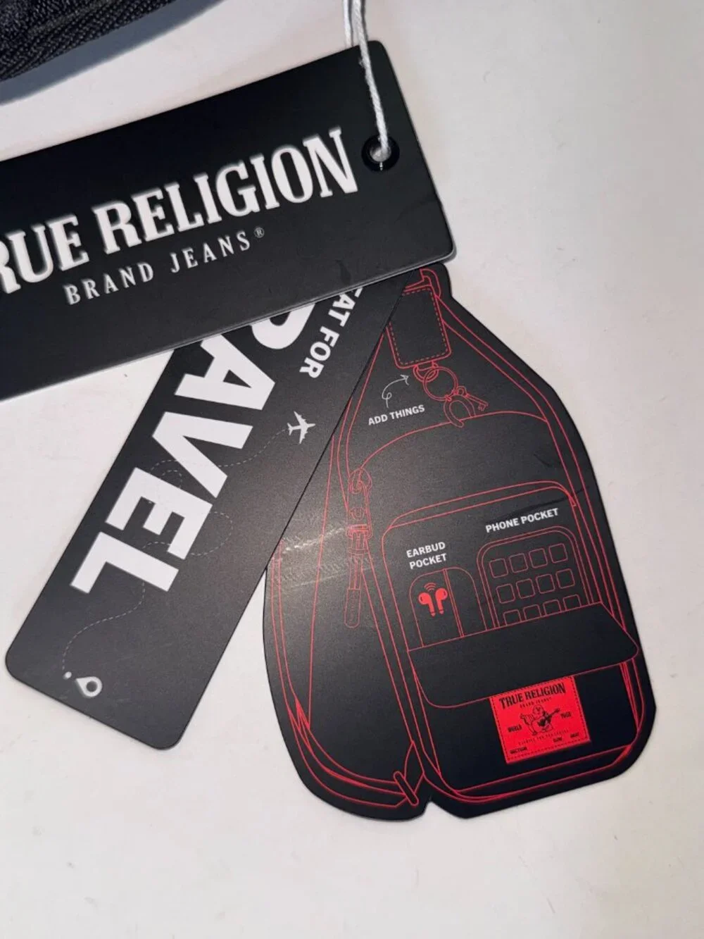 True Religion Sling Bag Features a Textured Brand Patch Durable Nylon With Red